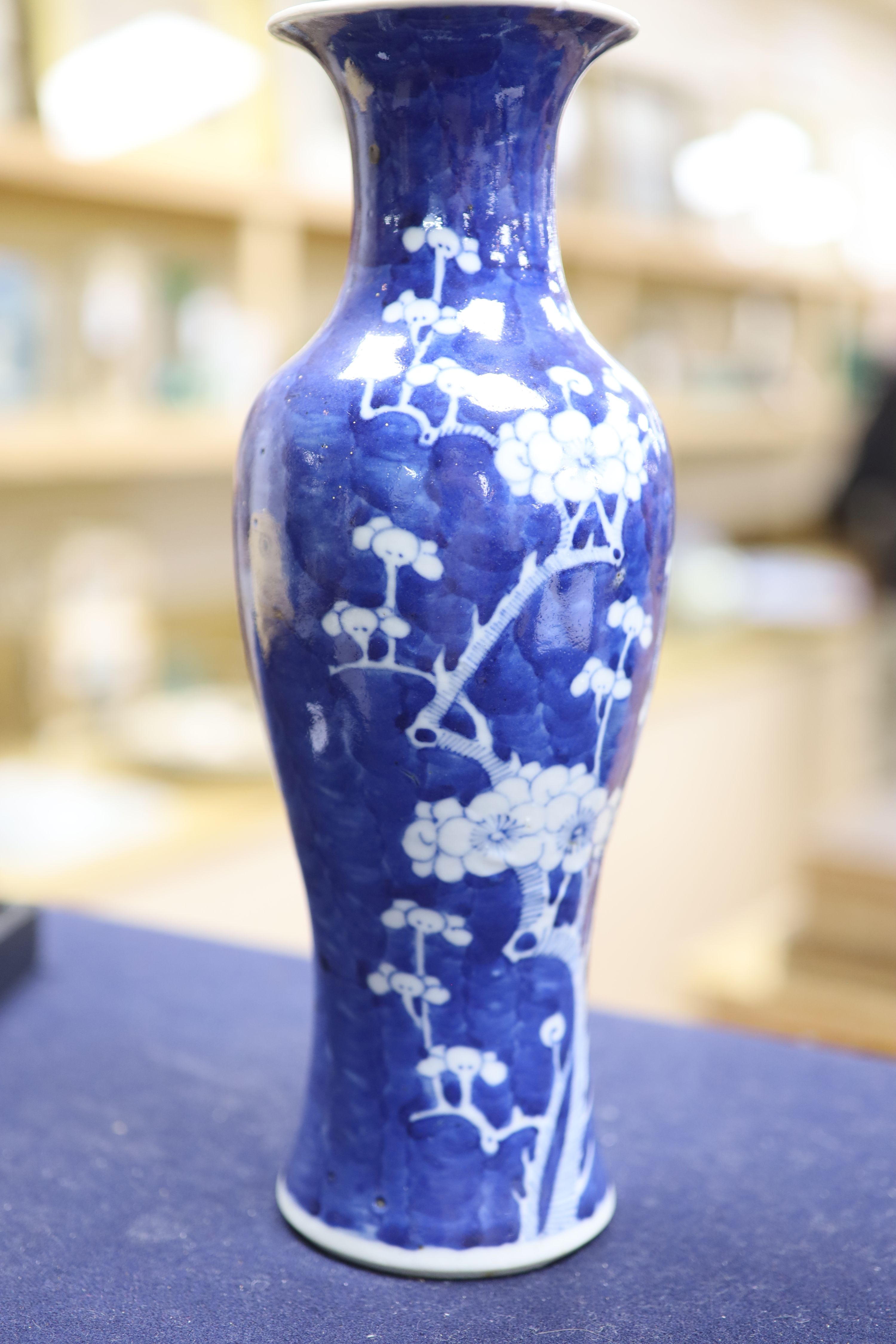 A pair of slender Chinese blue and white prunus vases, late 19th century, height 30cm